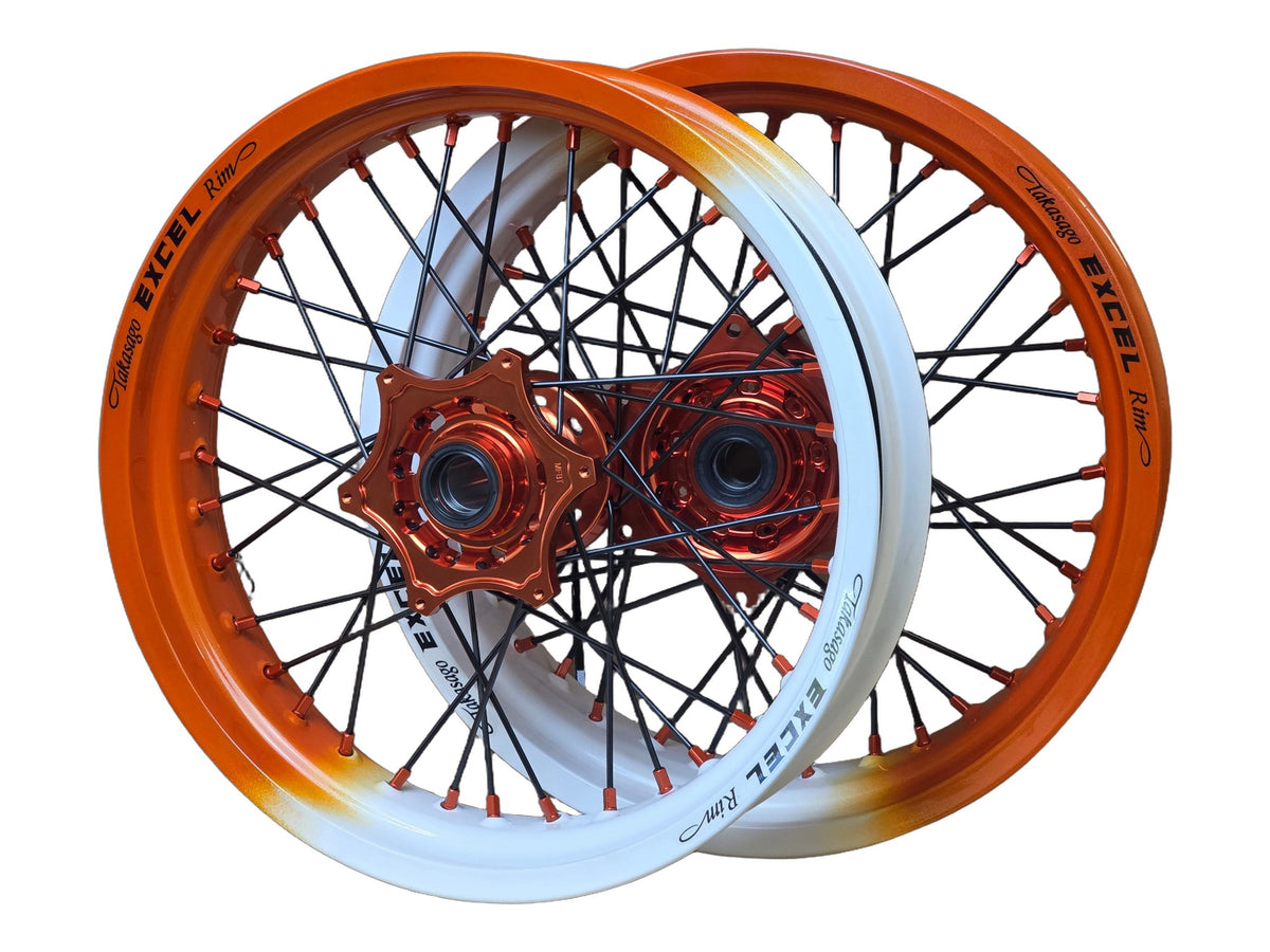 Supermoto Felgensatz 17 Zoll Excel Illusion Tangerine Twist / RAL 9016 mit EVSS Nabe Orange – vorne und hinten, freigestellt