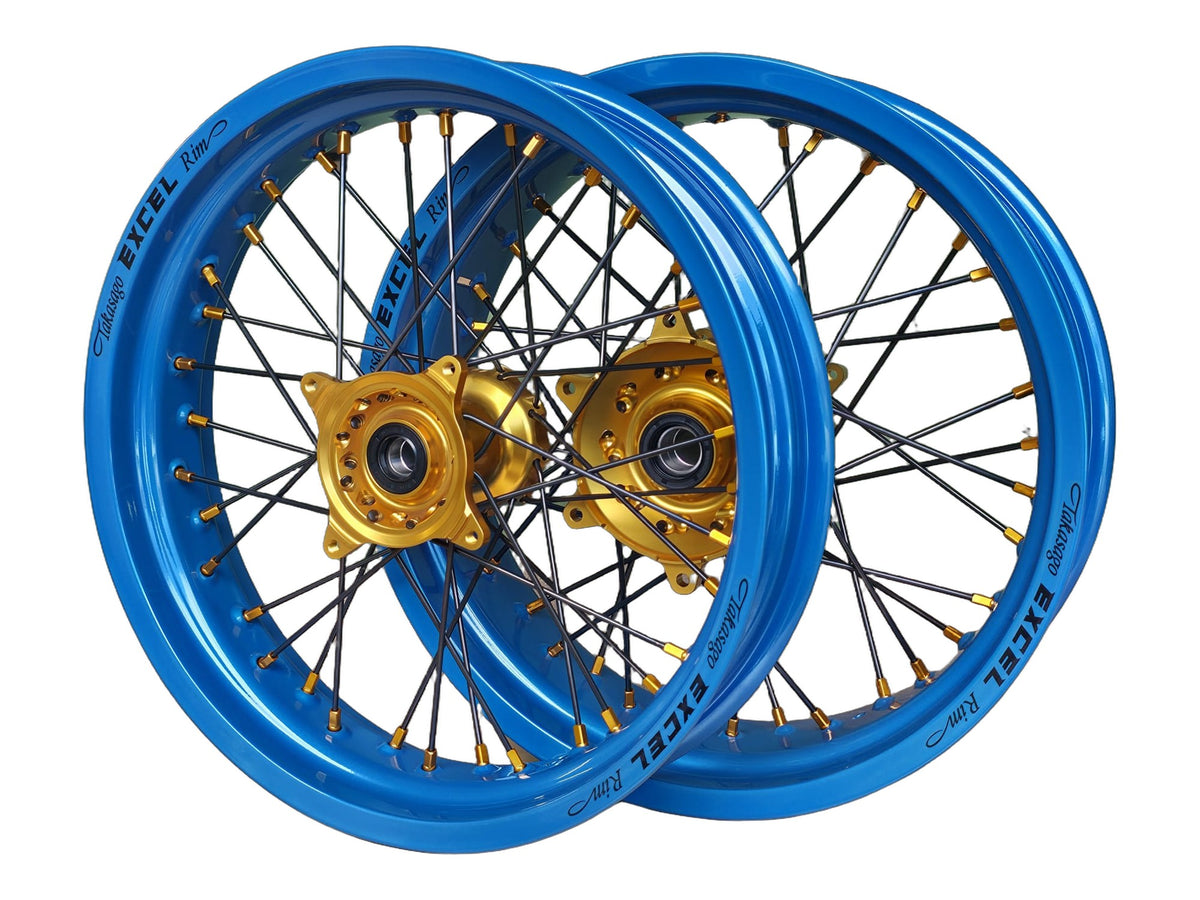 Supermoto Felgensatz 17 Zoll Excel Tropical Blue Step 1+2 mit Haan Nabe Gold – vorne und hinten, freigestellt